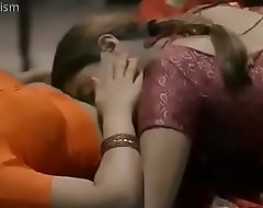 Hot women in saree giving a kiss