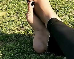 Indian desi bhabhi similar her distress toenails in black nailpolish at resuscitate