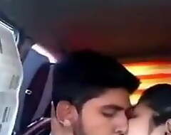 Tamil paramours giving a kiss anent jalopy and having sex