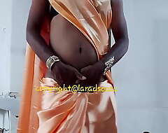indian sexy crossdresser slattern Lara D'Souza in orange satin saree