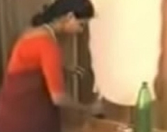 red saree lady removing duds and loving with young guy.3GP