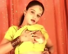 Big-busted Indian bhabi plays with their way bosom with the addition of slit