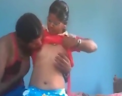 Piping hot desi north indian couple fucking blue cagoule bearing