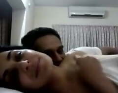 Indian couple in hotel room