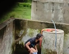 Indian Village Girl Bathing All over Pipeline Reservoir Outdoor