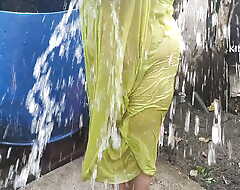 Anita yadav bathing outside in the matter of dance