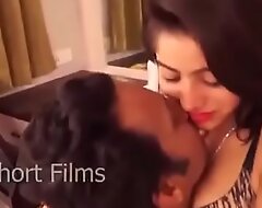 Gundu very fair desi Nicky Bagri giving a kiss with the addition of konjings