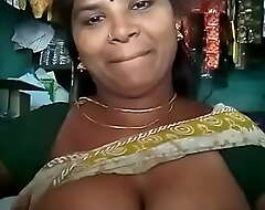 Sexy Tamil aunty showing her boobs