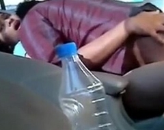 Indian couple making out on the car
